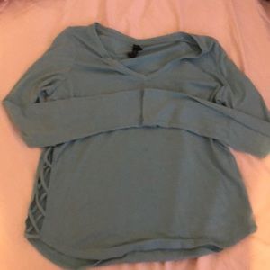 A teal long sleeve shirt!